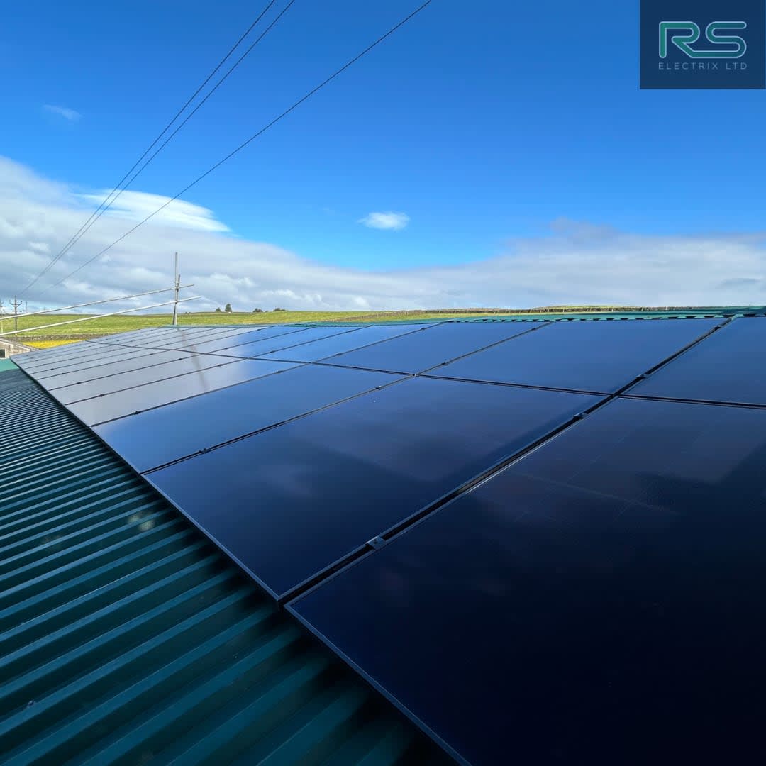 Large rooftop solar panel array installed by Renewable Specialists