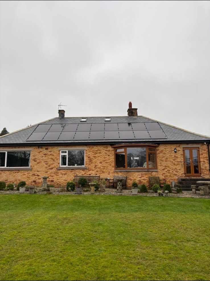 Eighteen LONGi all-black solar panels installed with a GSE in-roof mounting system