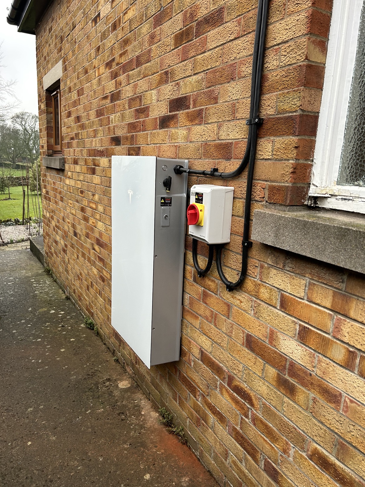 Tesla Powerwall 3 and isolation equipment installed on the property
