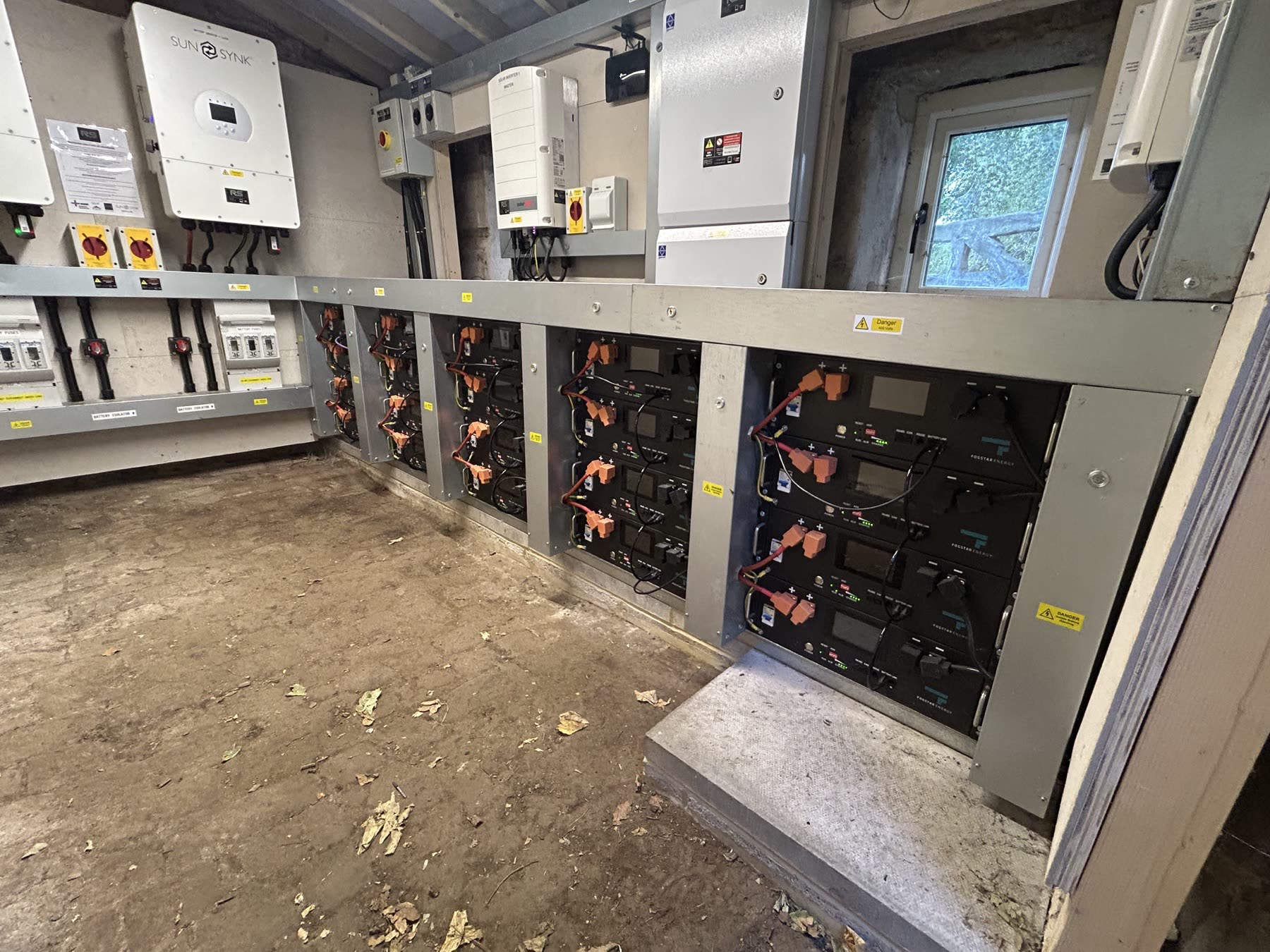 Rack-mounted Fogstar battery modules within galvanised steel containment