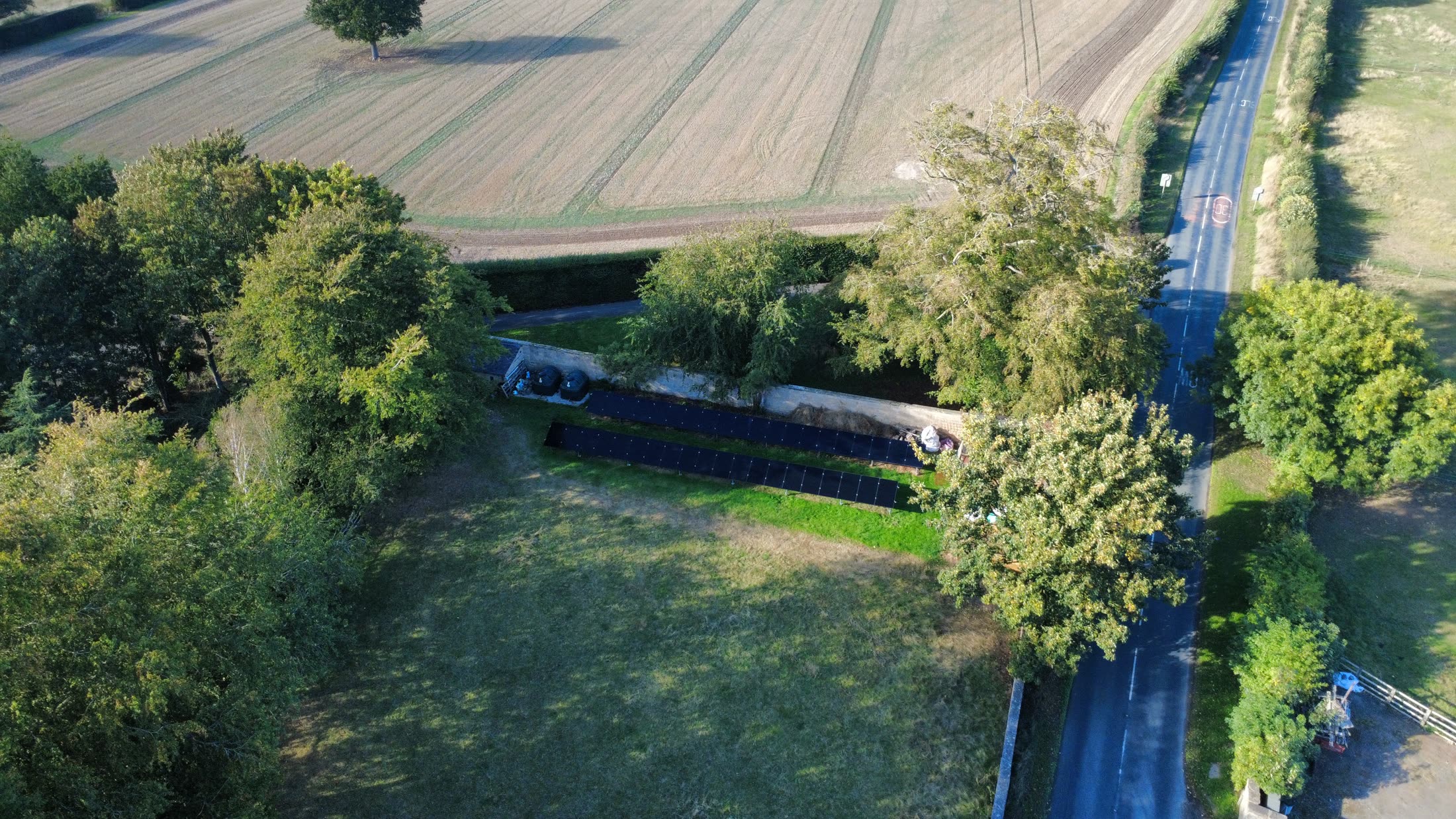 High aerial view showing the solar array within the North Deighton property
