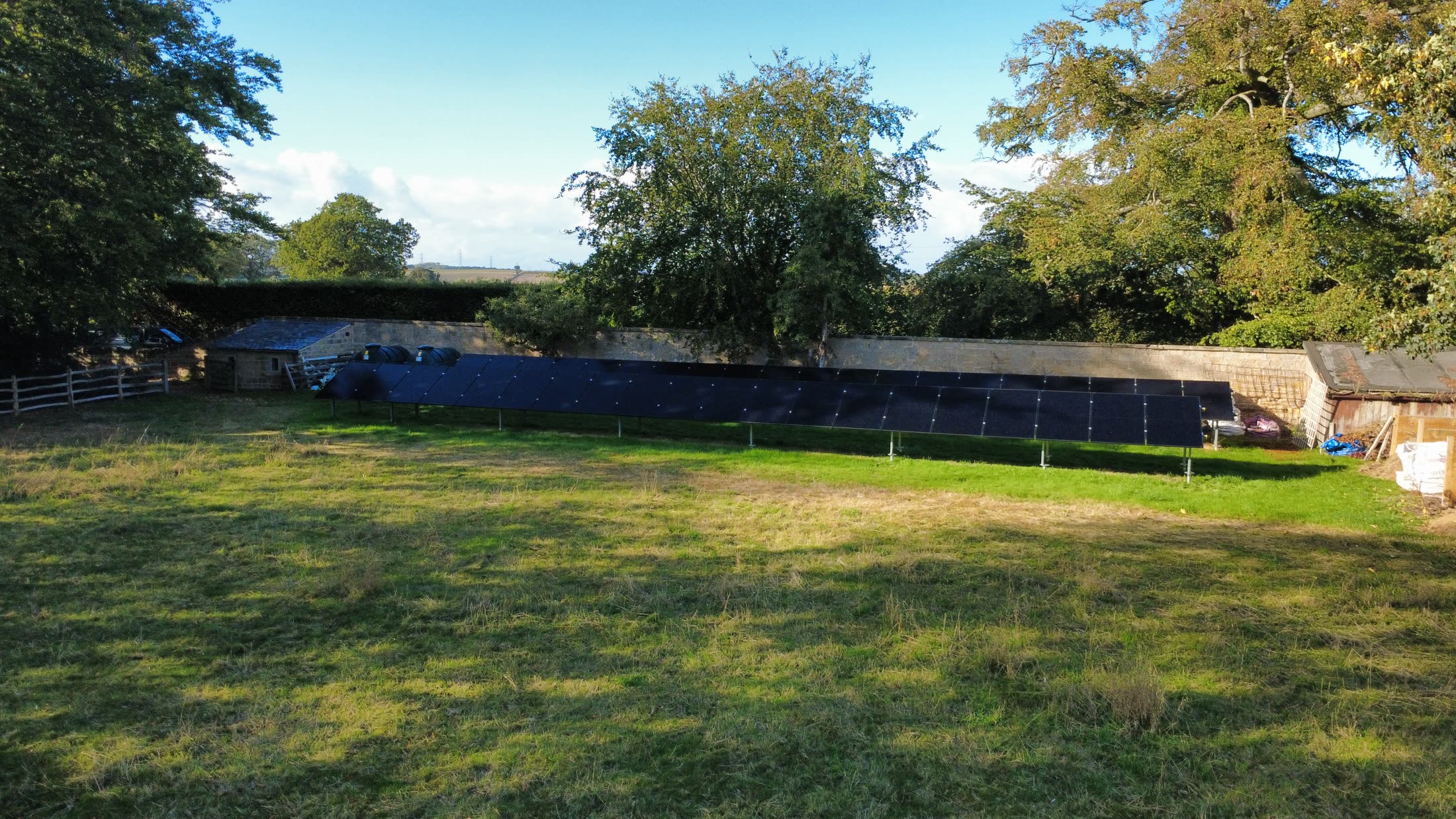 Wide view of the two-row Solarport ground-mounted system