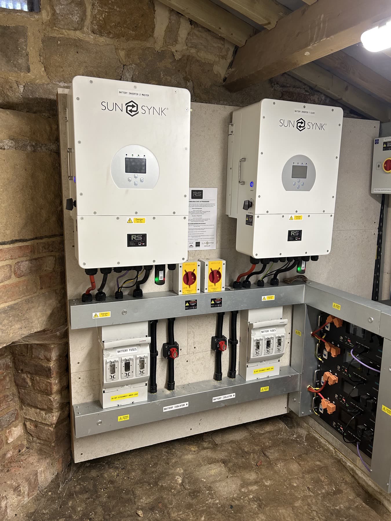 Two 12 kW three-phase Sunsynk hybrid inverters and battery protection equipment