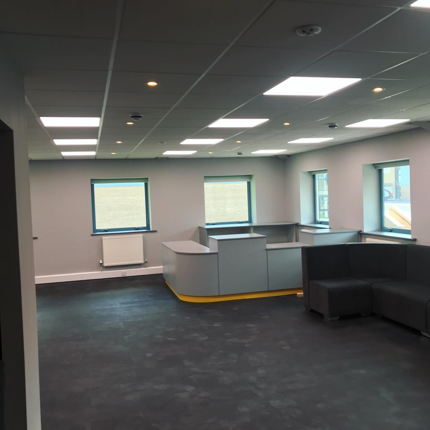 Finished customer area with integrated lighting at OsteoStrong