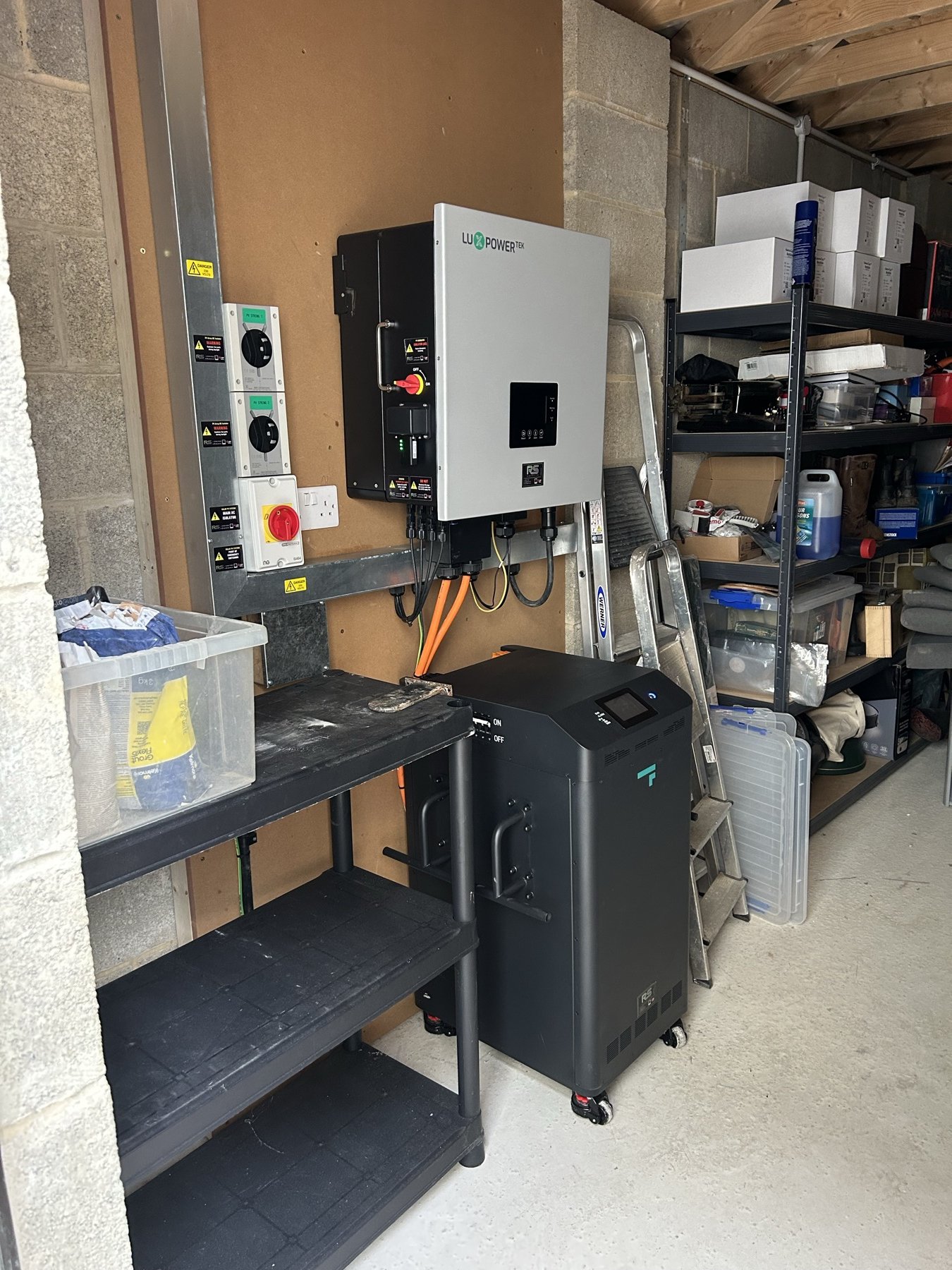Side view of the LuxPower inverter, isolation equipment and Fogstar battery installation