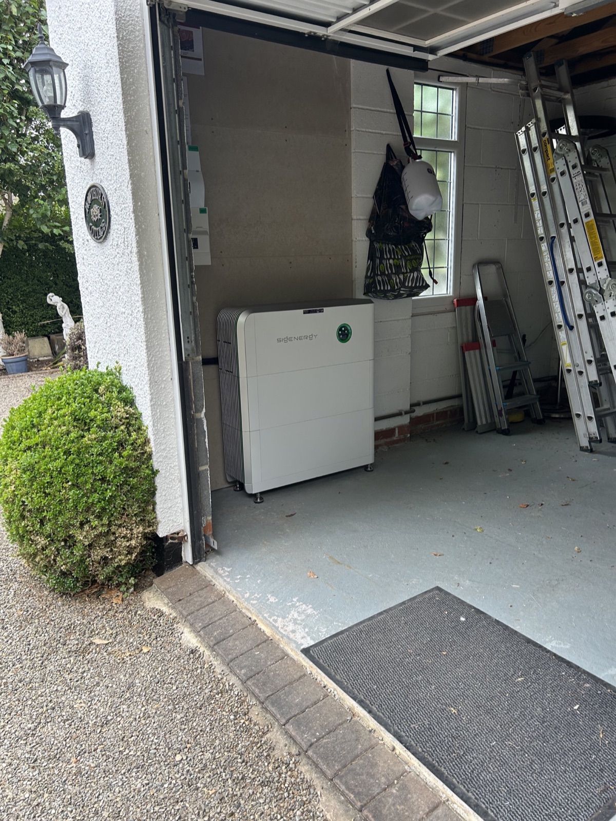 Completed SigenStor battery and inverter installation in the garage